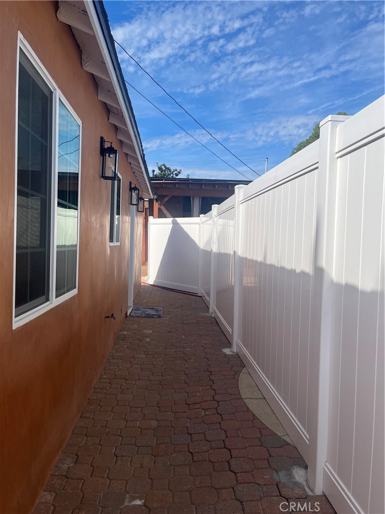 10840 Van Ruiten Street Norwalk, CA 90650 - Photo 12 of 13 Nice vinyl fencing for your privacy and security