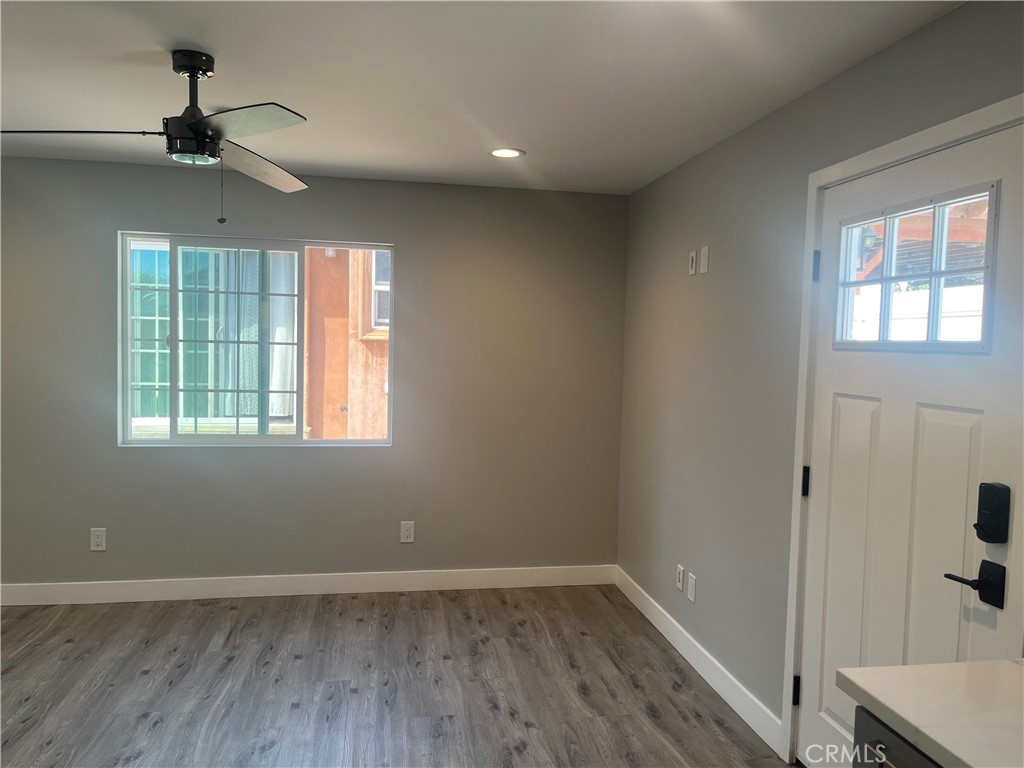 10840 Van Ruiten Street Norwalk, CA 90650 - Photo 3 of 13 Livingroom has lots of lights from two windows and entry door.