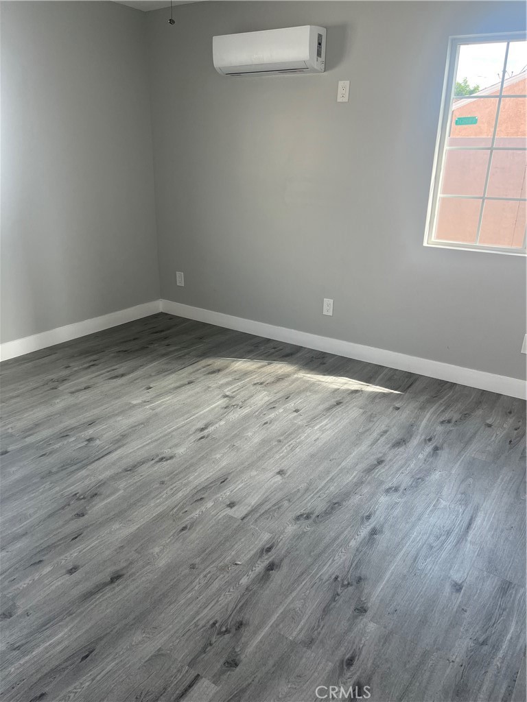 10840 Van Ruiten Street Norwalk, CA 90650 - Photo 7 of 13 Beautiful flooring throughout.