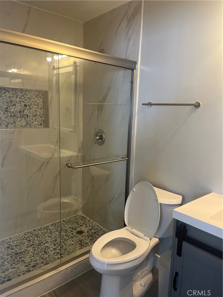 10840 Van Ruiten Street Norwalk, CA 90650 - Photo 8 of 13 Spacious shower and high-rise toilet.