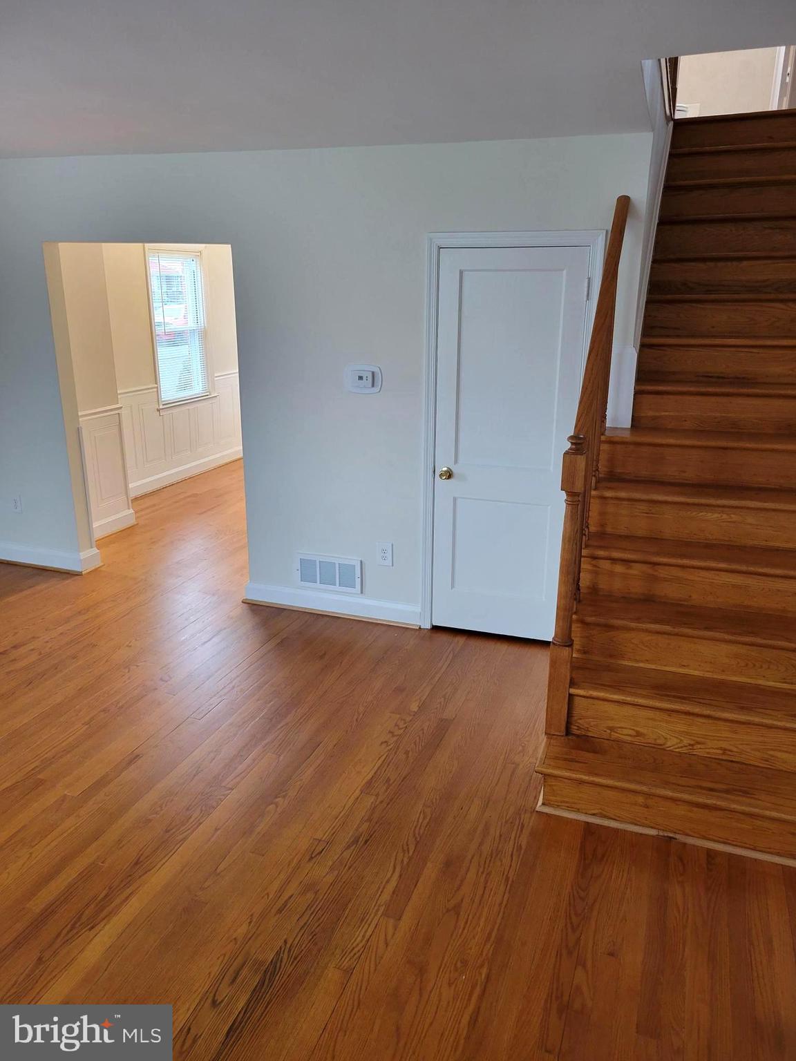 401 Grovethorn Road Middle River, MD 21220 - Photo 7 of 20 Living room and stairway to upper level