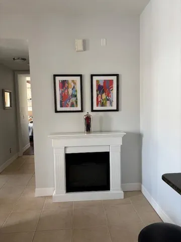 a kitchen with stainless steel appliances granite countertop a sink a refrigerator and a stove