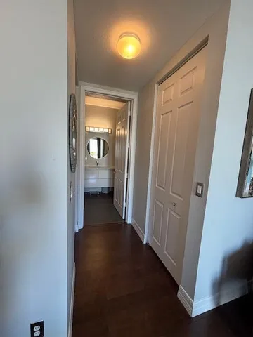 a view of balcony with wooden floor