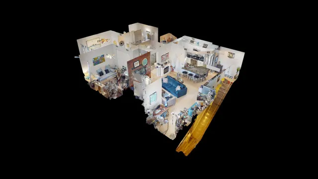a bathroom with a granite countertop sink a vanity and shower curtain