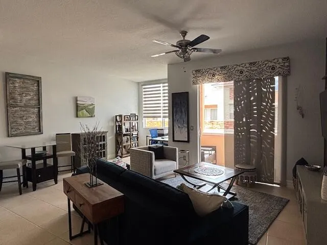 a living room with furniture and a window