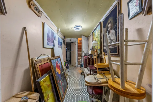 a bedroom with bed and a closet