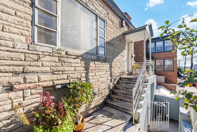 a car parked in front of a house