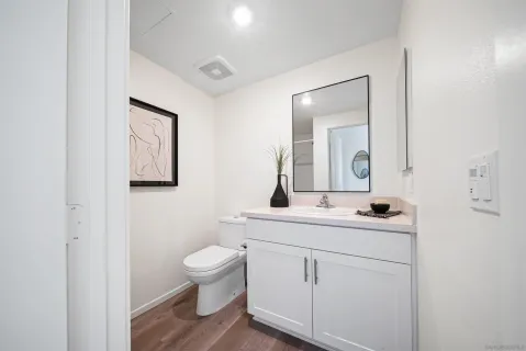 a bedroom with a bed and a couch