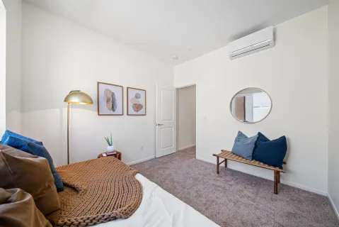 a bathroom with a glass shower door