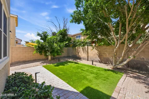 a view of a backyard with a garden