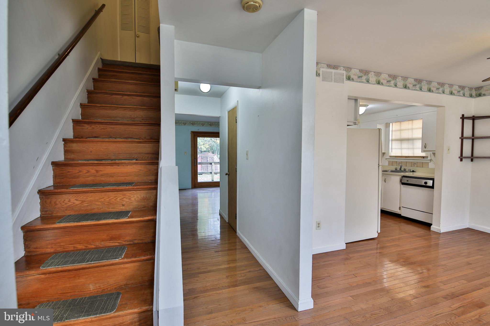 531 Locust Avenue Westminster, MD 21157 - Photo 7 of 31 a view of a hallway with wooden floor and entryway