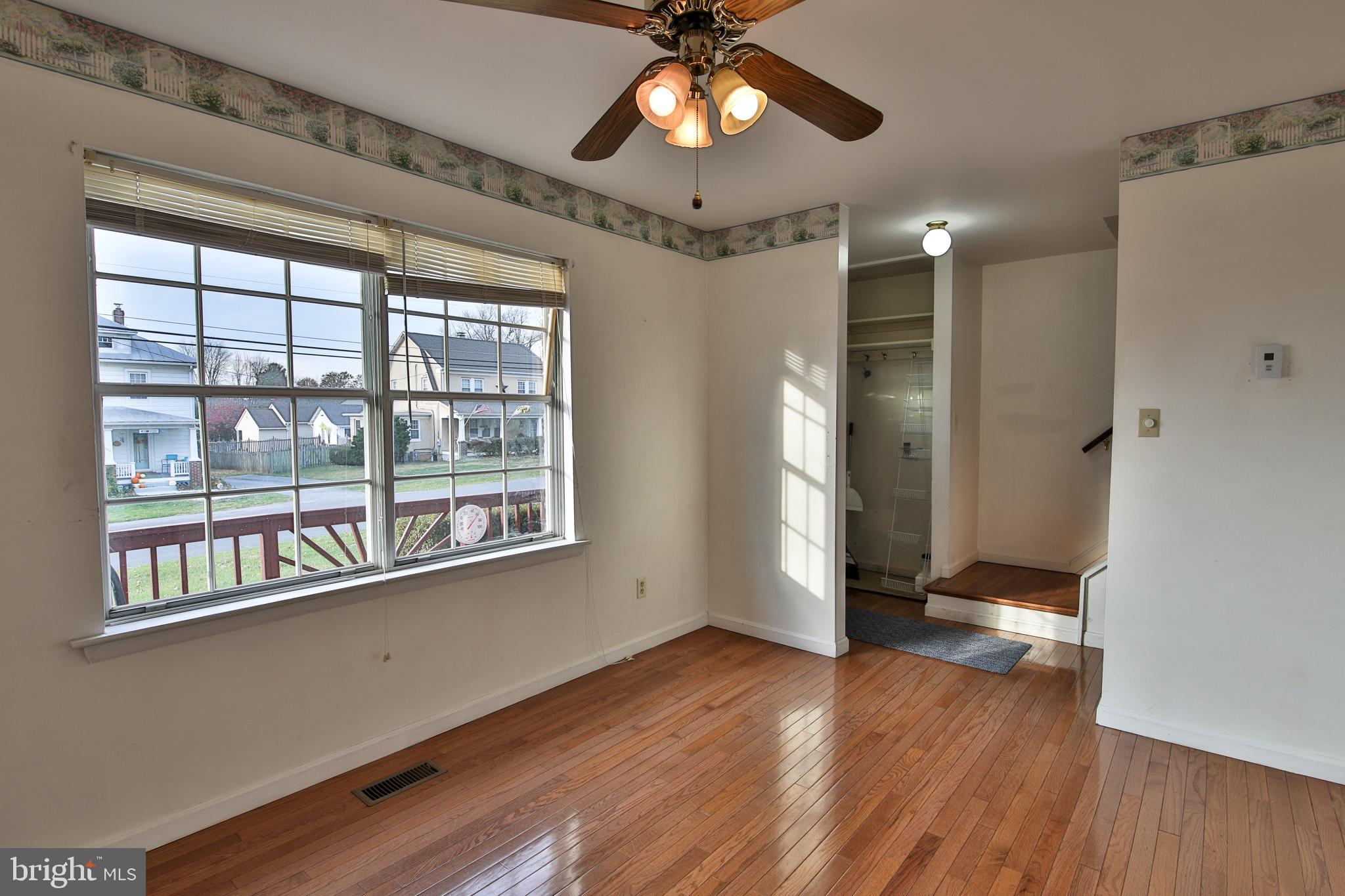 531 Locust Avenue Westminster, MD 21157 - Photo 10 of 31 a view of an empty room with window and wooden floor