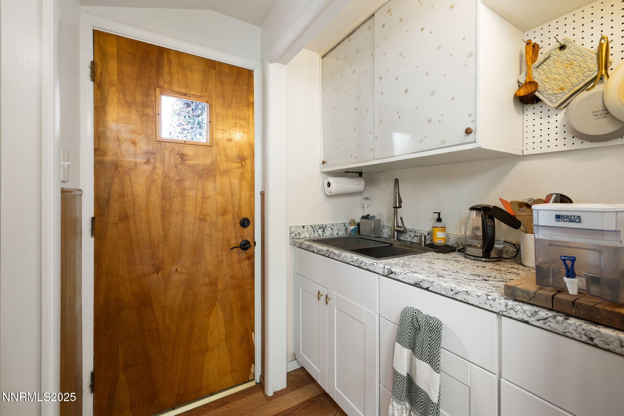 1835 Marlette Avenue Reno, NV 89503 - Photo 29 of 36 a kitchen with stainless steel appliances granite countertop a sink and cabinets