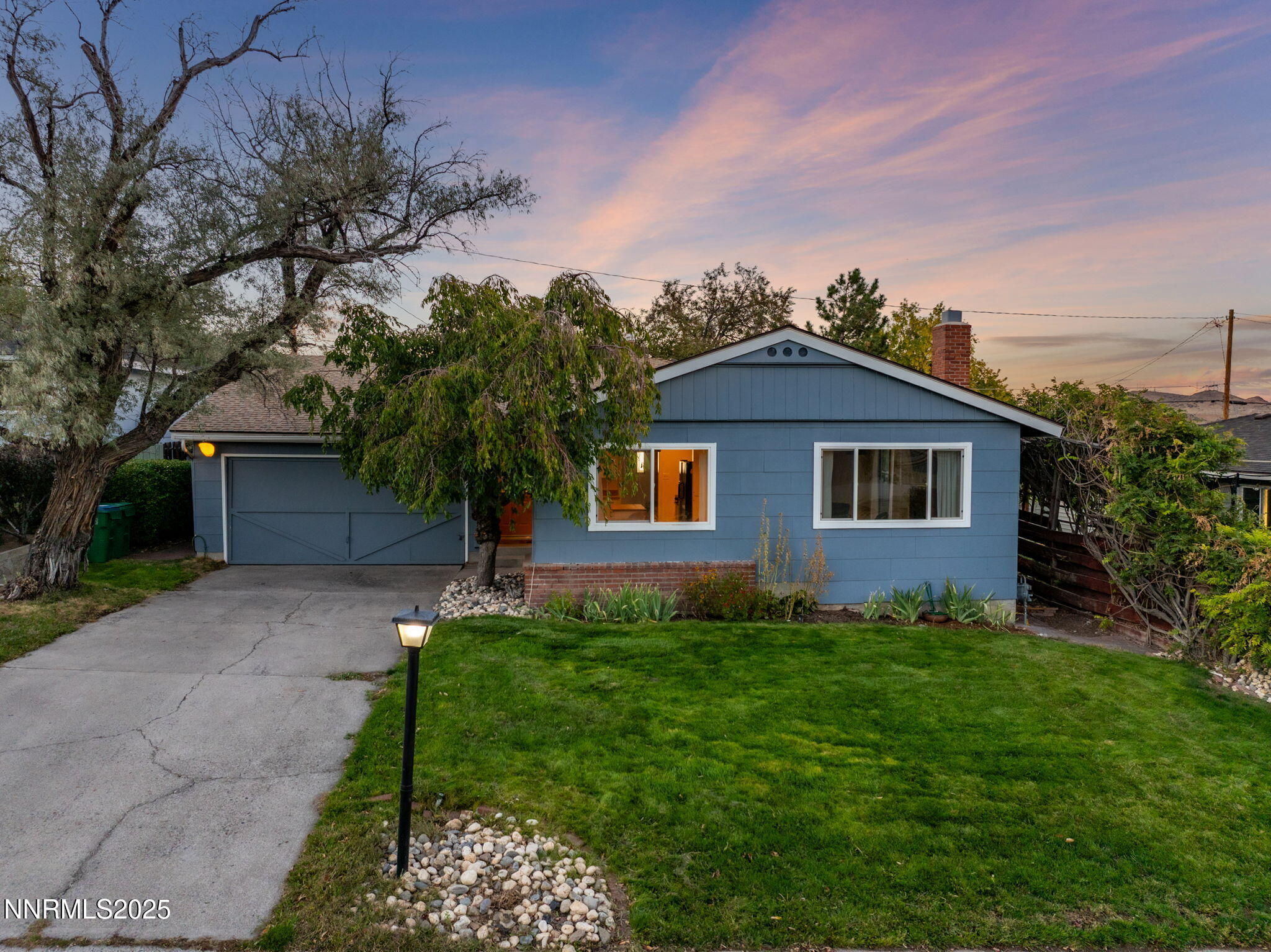 1835 Marlette Avenue Reno, NV 89503 - Photo 3 of 36 a front view of a house with garden