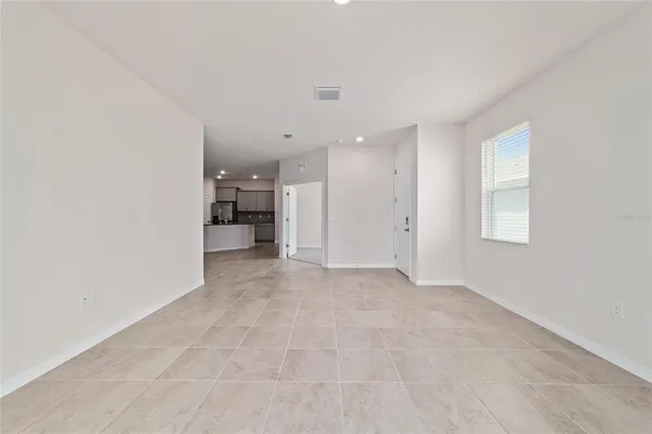 an empty room with a natural light