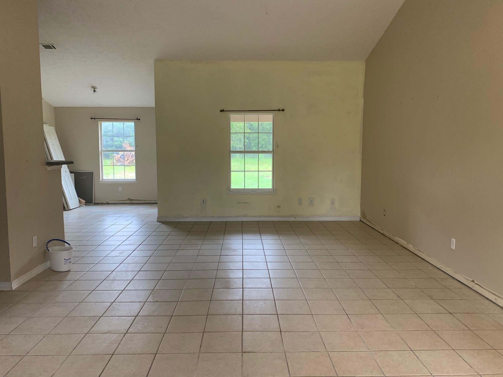 657 Elmwood Road DeFuniak Springs, FL 32433 - Photo 5 of 15 an empty room with windows