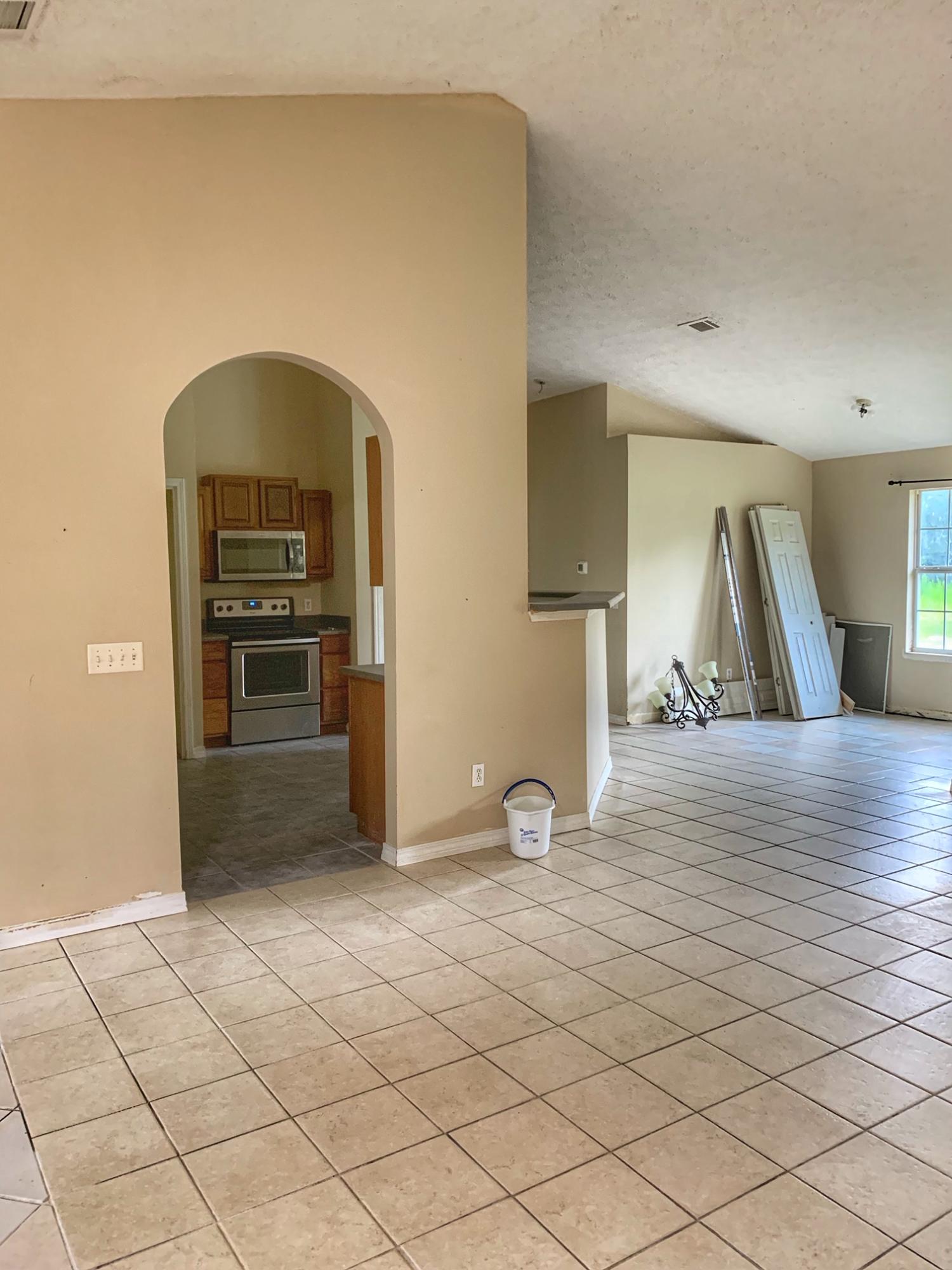 657 Elmwood Road DeFuniak Springs, FL 32433 - Photo 7 of 15 a view of empty room with wooden floor