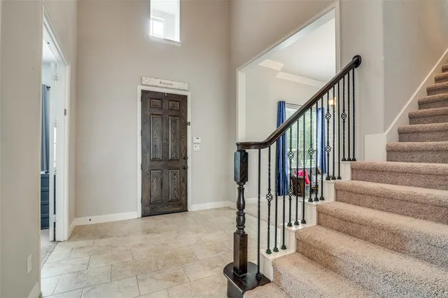 a view of an entryway with stairs