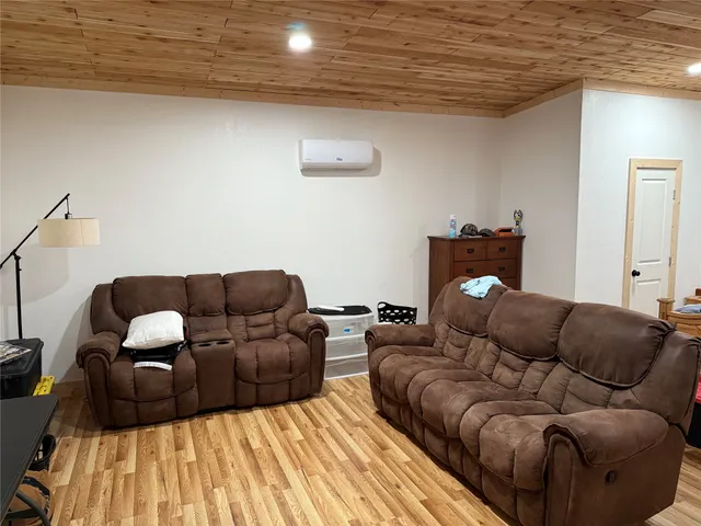 a living room with furniture and a couch