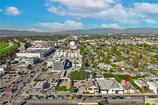 an aerial view of residential building with parking space