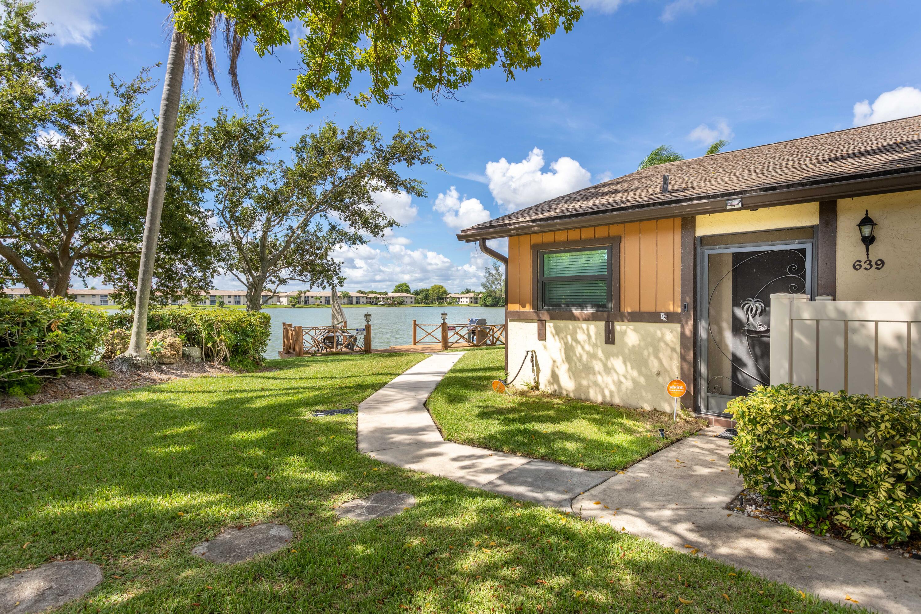 639 Banks Road Margate, FL 33063 - Photo 26 of 44 Lake Villa Exterior
