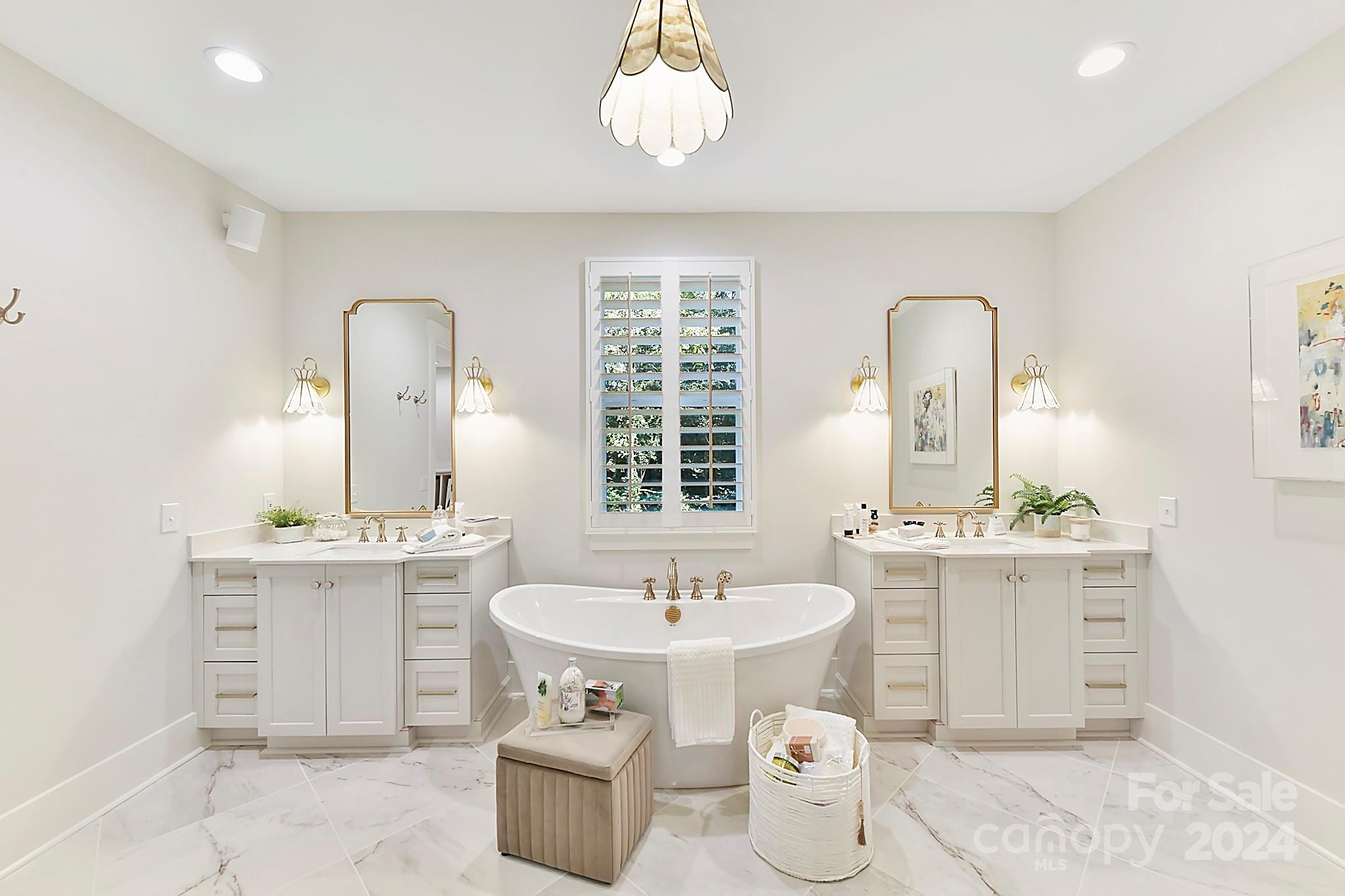 335 Bubbling Well Road Matthews, NC 28105 - Photo 17 of 48 a bathroom with a sink and a mirror