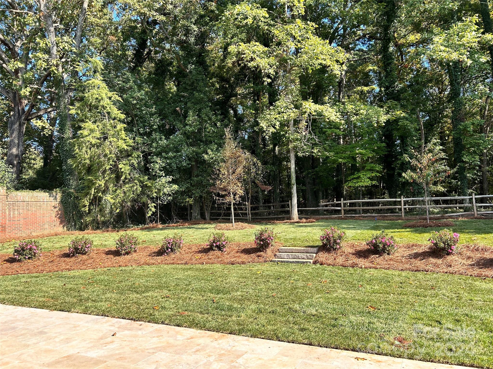 335 Bubbling Well Road Matthews, NC 28105 - Photo 2 of 48 a view of a lake view