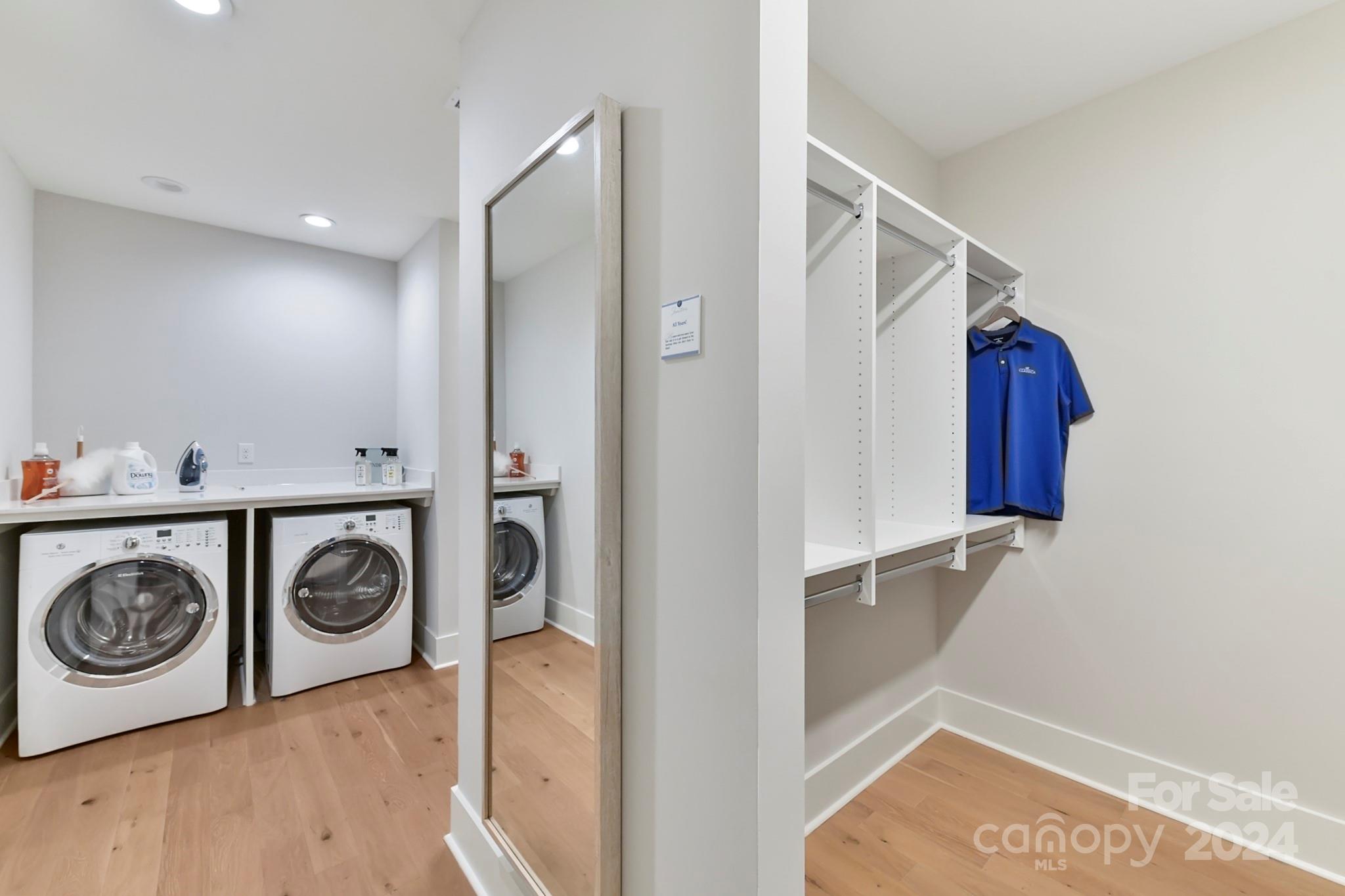335 Bubbling Well Road Matthews, NC 28105 - Photo 21 of 48 a utility room with dryer and washer