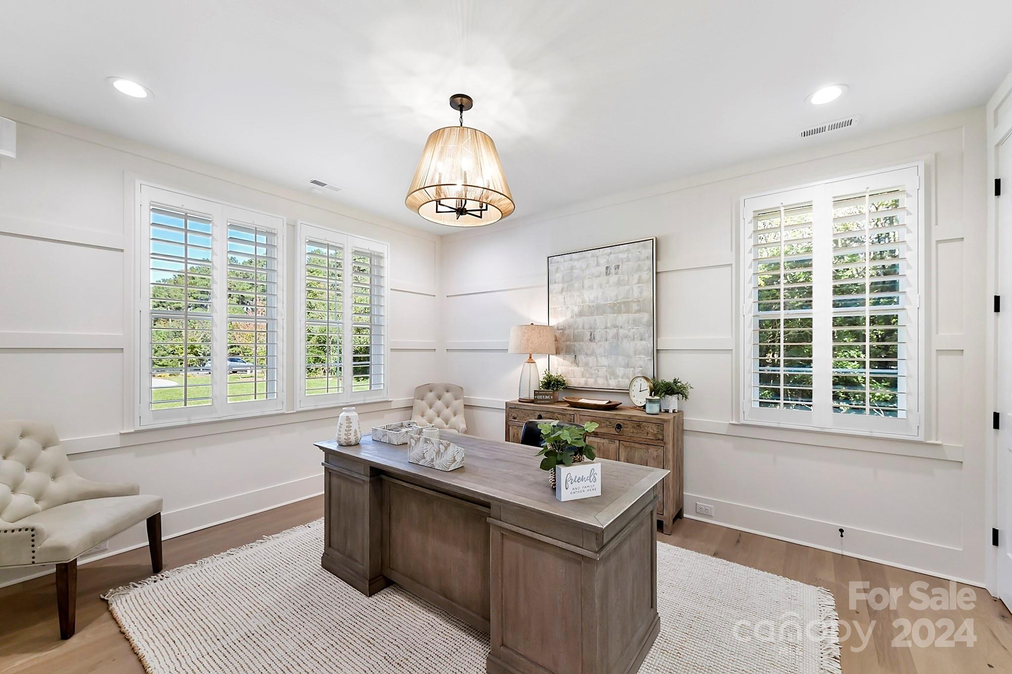 335 Bubbling Well Road Matthews, NC 28105 - Photo 23 of 48 a room with chandelier furniture and window