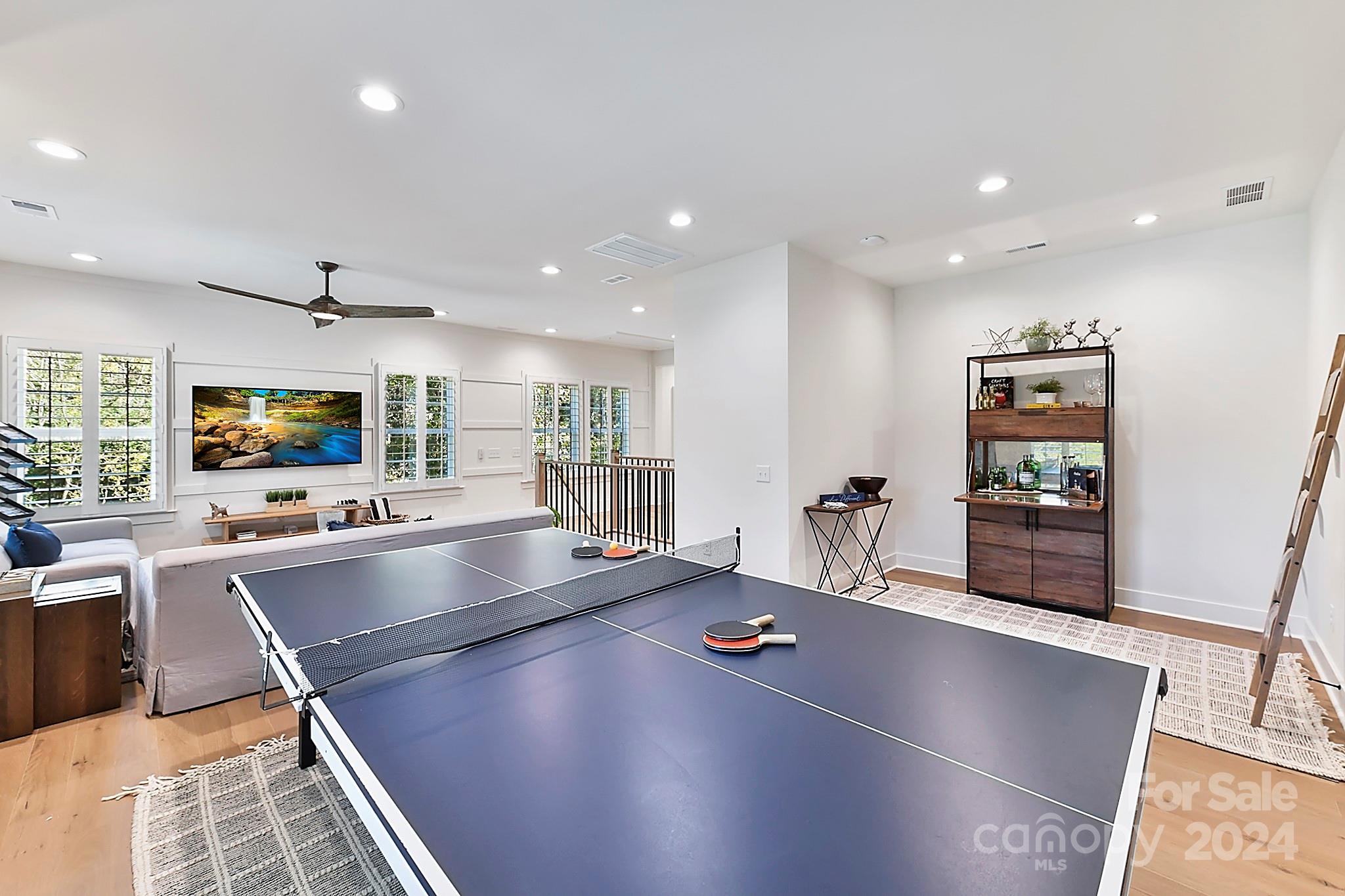 335 Bubbling Well Road Matthews, NC 28105 - Photo 31 of 48 a living room with stainless steel appliances furniture and a kitchen view
