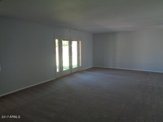 3424 East Camelback Road Phoenix, AZ 85018 - Photo 23 of 27 a view of empty room with window