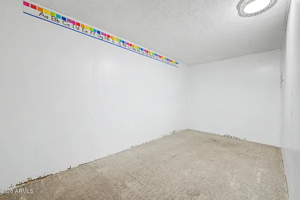 a view of a living room with a large window