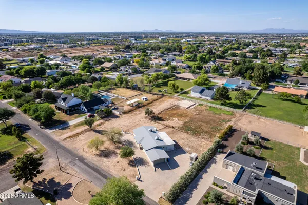 an aerial view of a city with lots of residential buildings