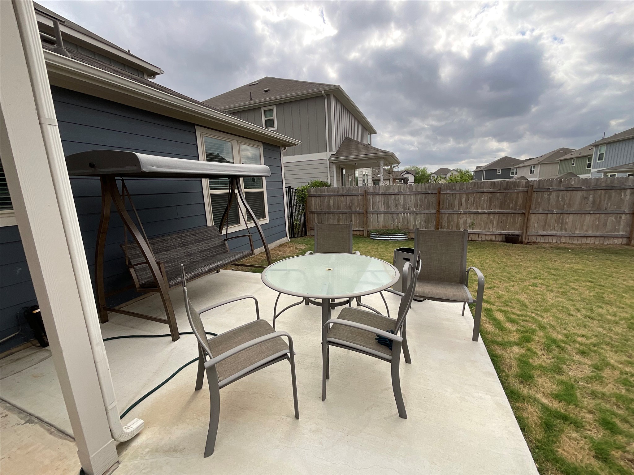 5425 Durango Pass Austin, TX 78724 - Photo 30 of 32 Fenced backyard with a patio