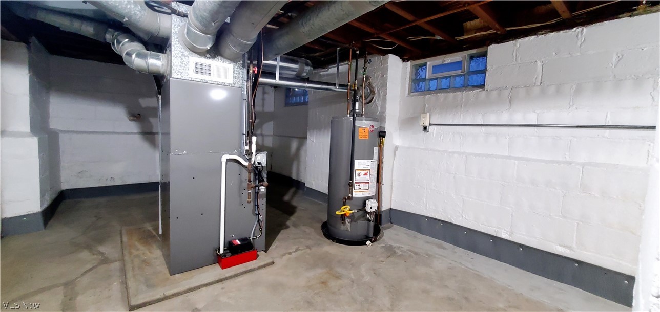 4348 Prasse Road South Euclid, OH 44121 - Photo 10 of 10 Utility area with a brand-new HVAC system (furnace & AC), glass block windows, and professional waterproofing by Ohio State Waterproofing