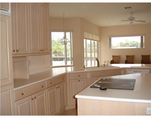 120 Northwest S Shore Road Stuart, FL 34994 - Photo 6 of 16 a living room with furniture and a large window