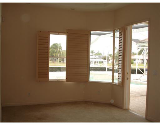 120 Northwest S Shore Road Stuart, FL 34994 - Photo 10 of 16 a view of an empty room with a window