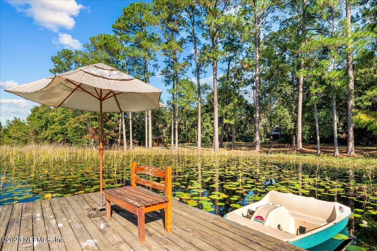 121 Peniel Church Road Palatka, FL 32177 - Photo 16 of 81 a view of a patio with furniture and a yard