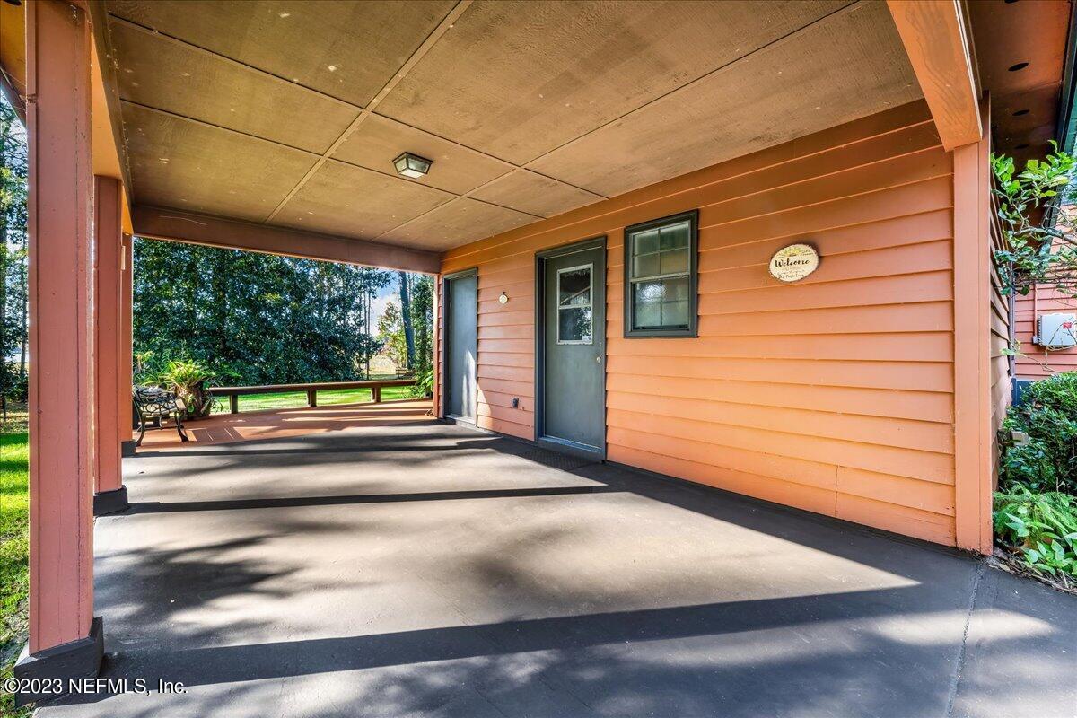121 Peniel Church Road Palatka, FL 32177 - Photo 20 of 81 a view of a door and chair front of house