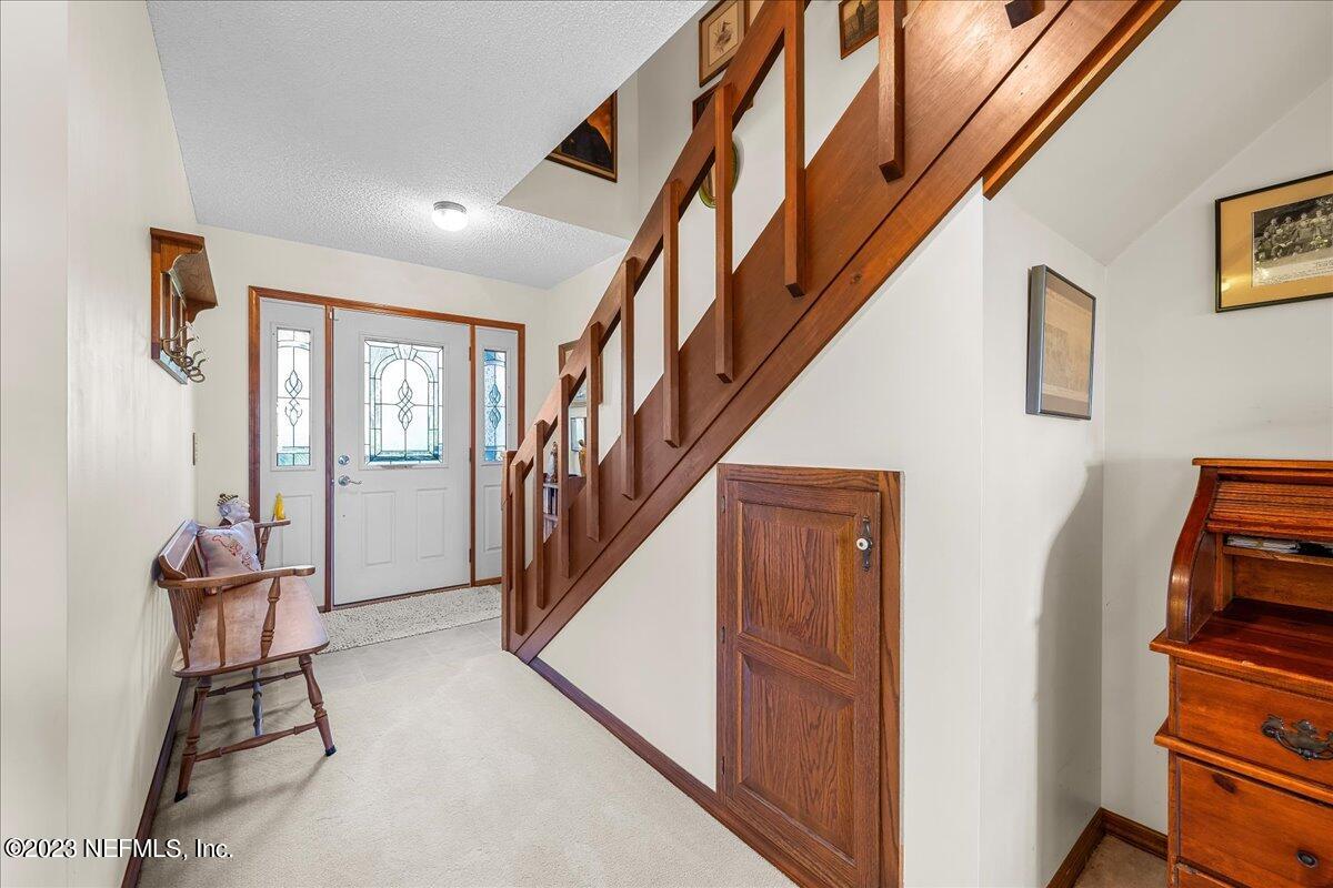 121 Peniel Church Road Palatka, FL 32177 - Photo 23 of 81 a view of an entryway with wooden floor and livingroom