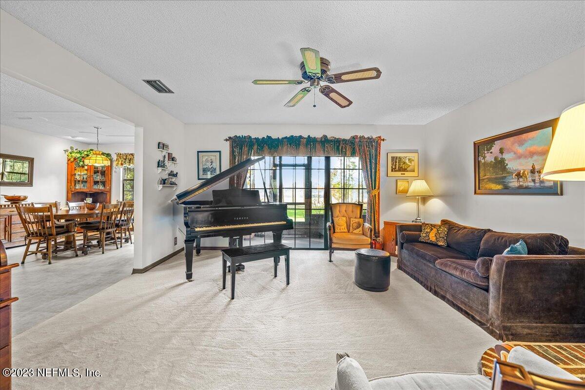121 Peniel Church Road Palatka, FL 32177 - Photo 24 of 81 a living room with furniture a couch and large window