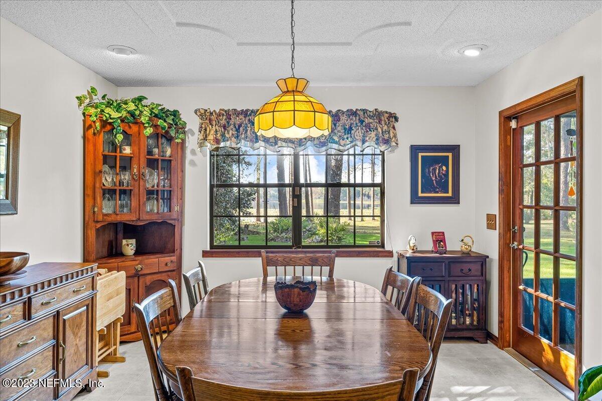 121 Peniel Church Road Palatka, FL 32177 - Photo 28 of 81 a view of a dining room with furniture window and outside view