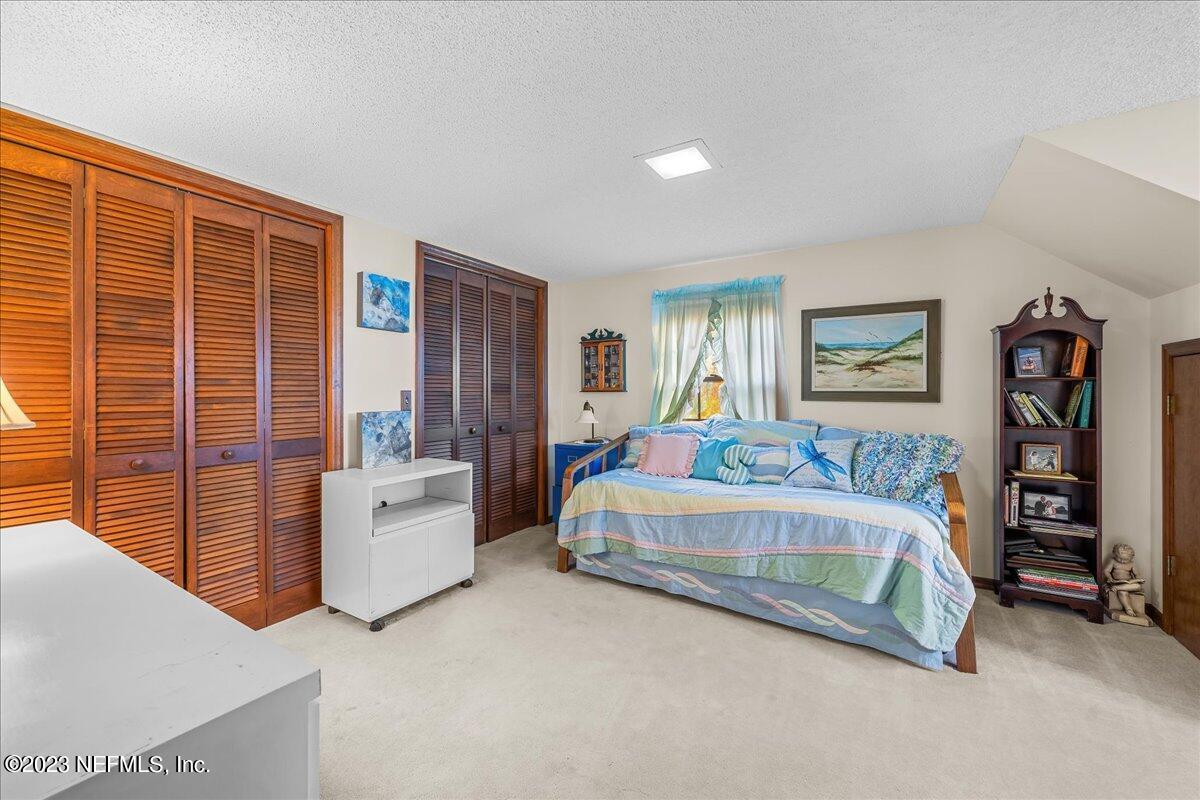 121 Peniel Church Road Palatka, FL 32177 - Photo 42 of 81 a spacious bedroom with a bed and dresser