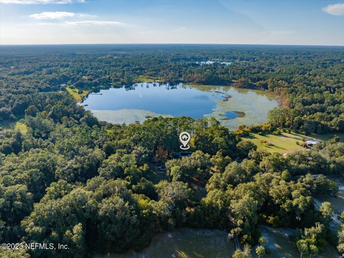 121 Peniel Church Road Palatka, FL 32177 - Photo 55 of 81 an aerial view of residential houses with outdoor space and lake view
