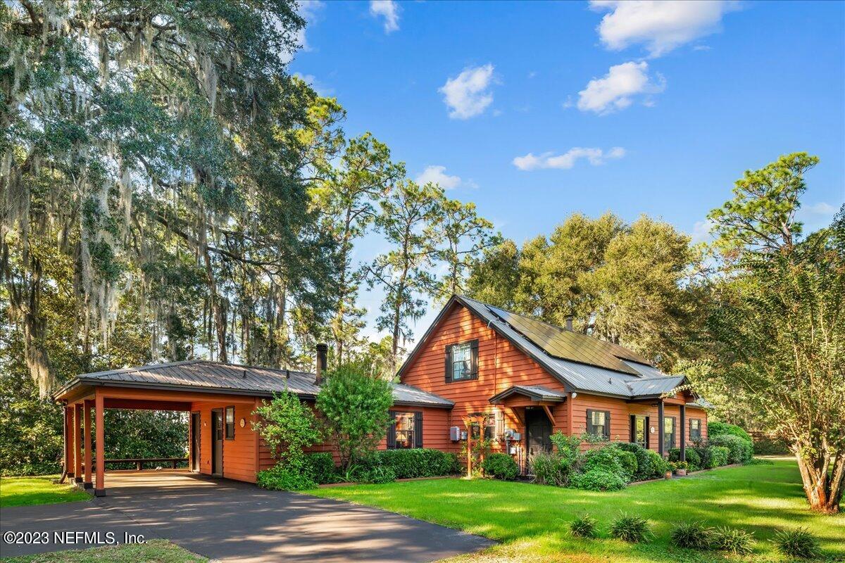 121 Peniel Church Road Palatka, FL 32177 - Photo 7 of 81 a front view of a house with garden
