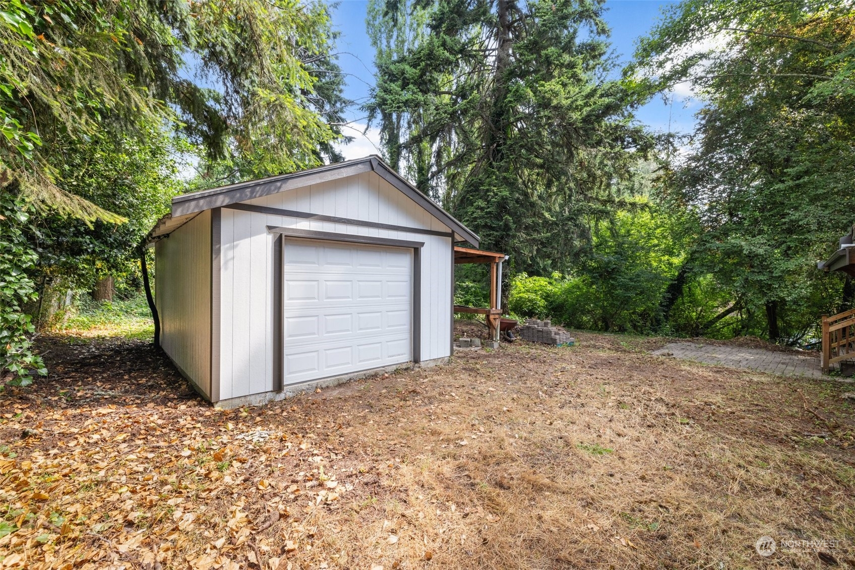 826 Southwest Dash Point Road Federal Way, WA 98023 - Photo 28 of 29 a view of a house with a yard and large tree