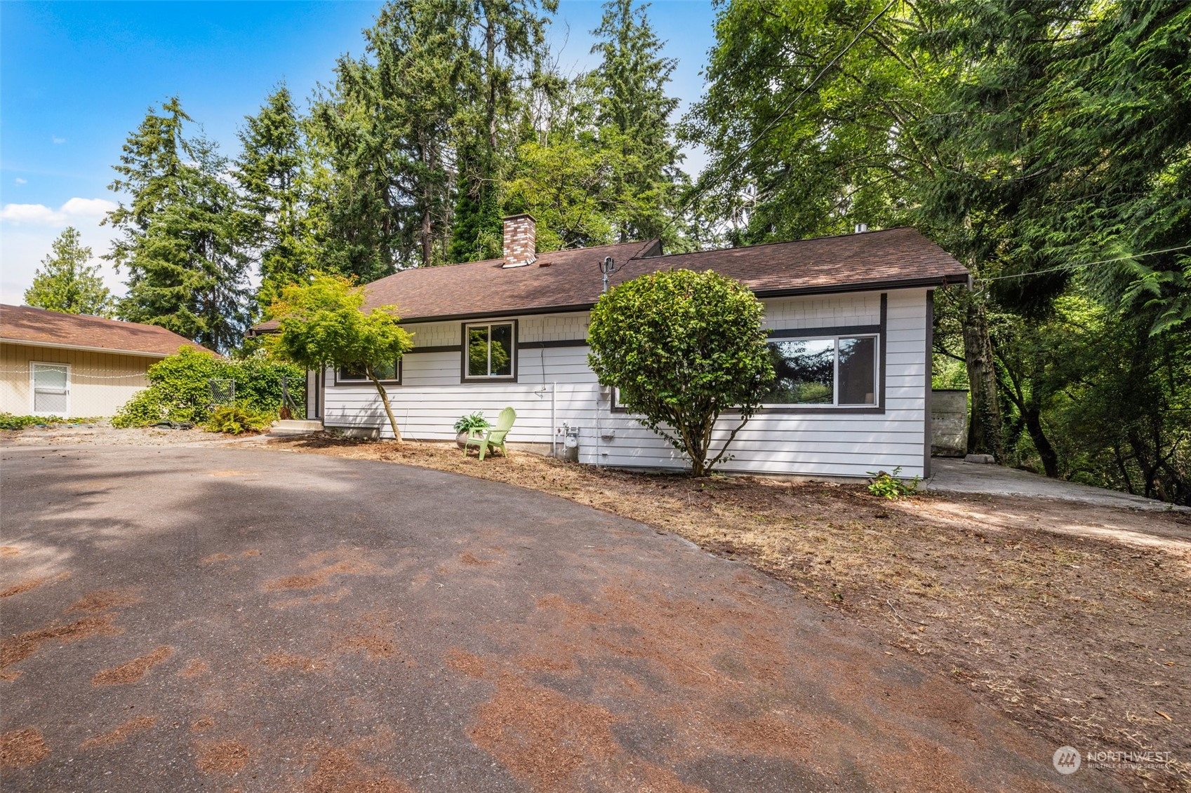 826 Southwest Dash Point Road Federal Way, WA 98023 - Photo 4 of 29 a view of a house with a yard and potted plants