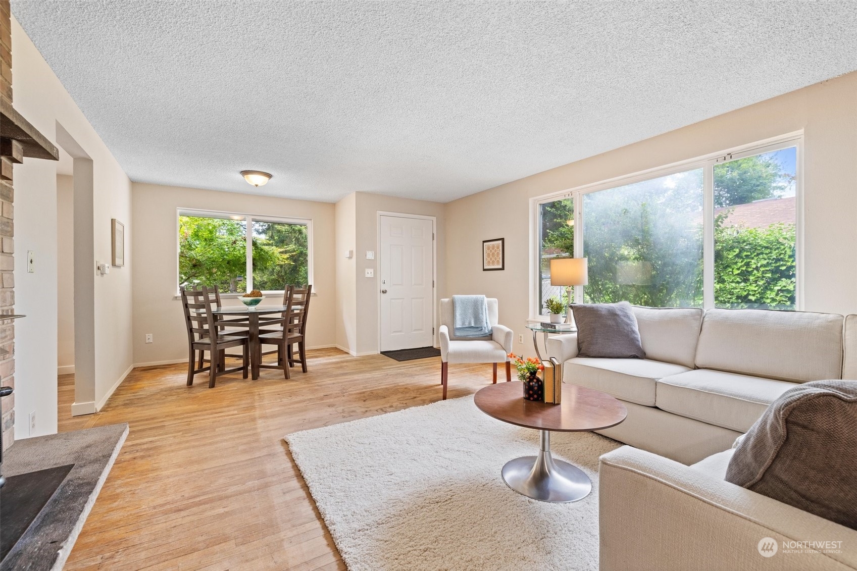 826 Southwest Dash Point Road Federal Way, WA 98023 - Photo 8 of 29 a living room with furniture and large windows