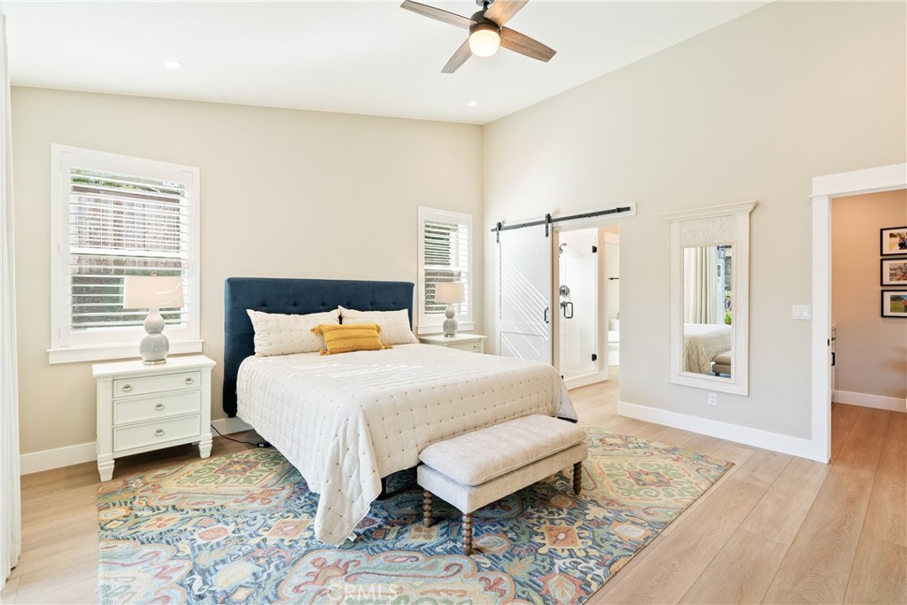 8550 El Corte Road Atascadero, CA 93422 - Photo 26 of 72 a spacious bedroom with a bed and a window