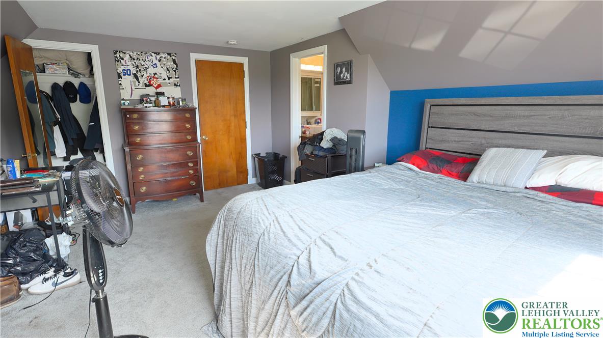 1345 Macada Road Bethlehem, PA 18017 - Photo 17 of 23 a bedroom with a bed and a closet